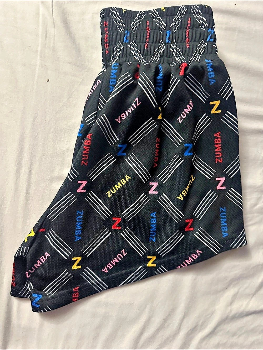 Zumba We Are Zumba Spicy Shorts Geometric Athletic Shorts in Black & Yellow Like